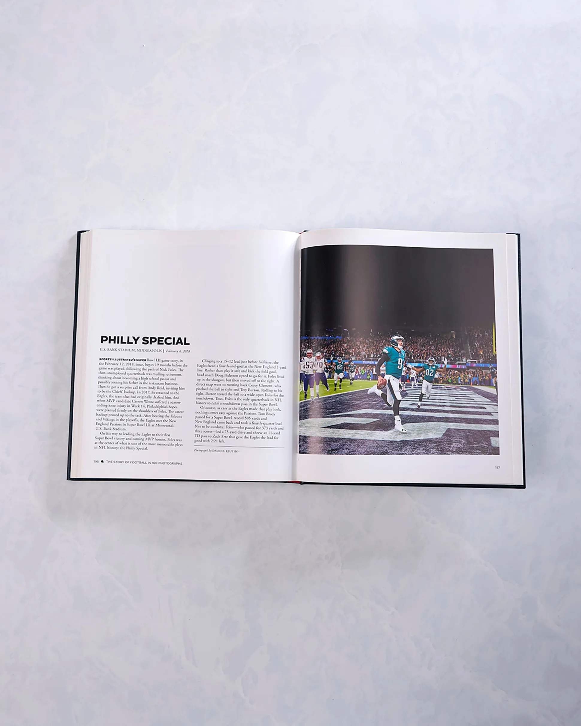 The Story of Football in 100 Photographs By Sports Illustrated in Navy Blue